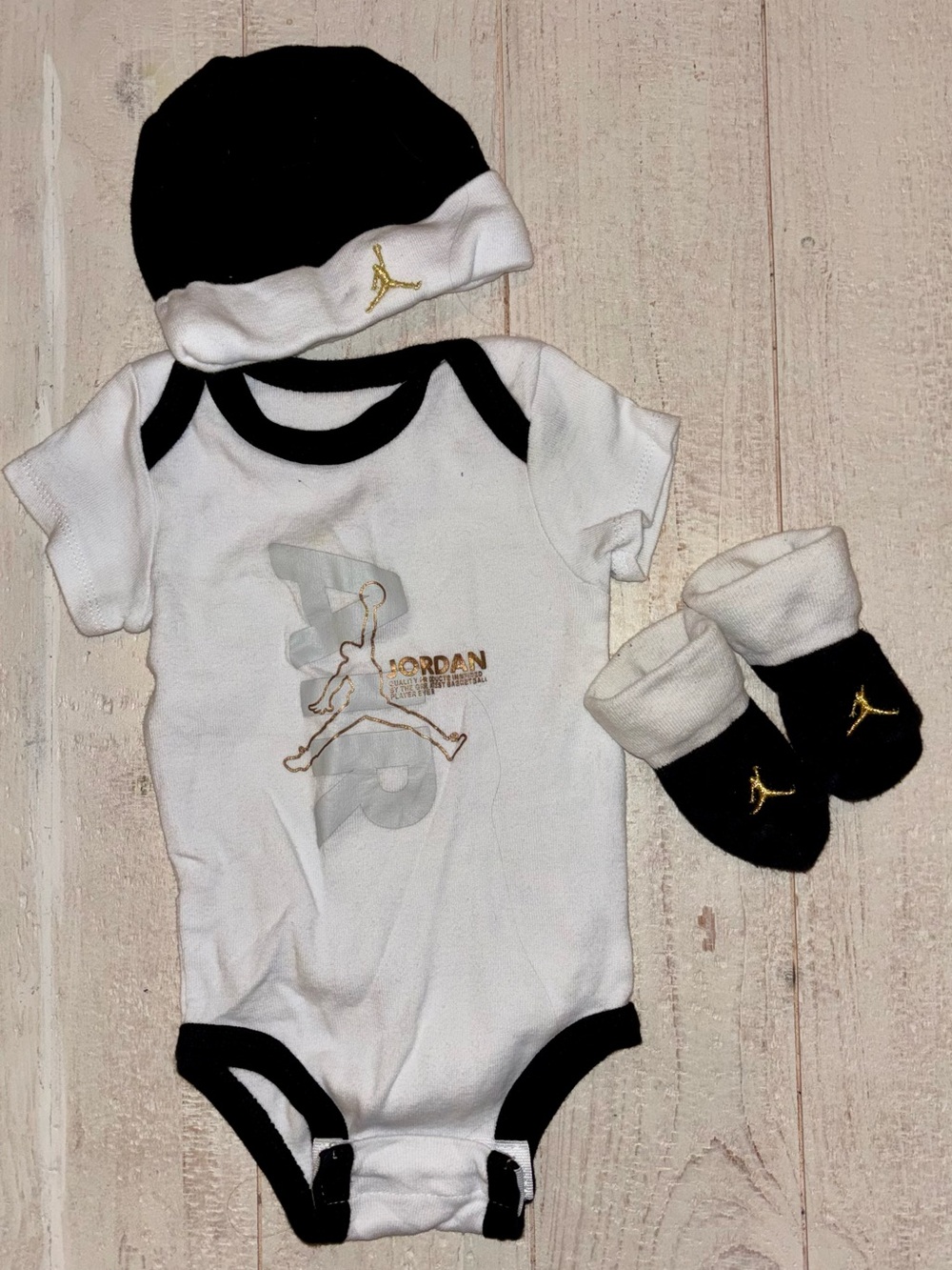 Jordan Baby One-Piece Set in White and Black with Gold Logo